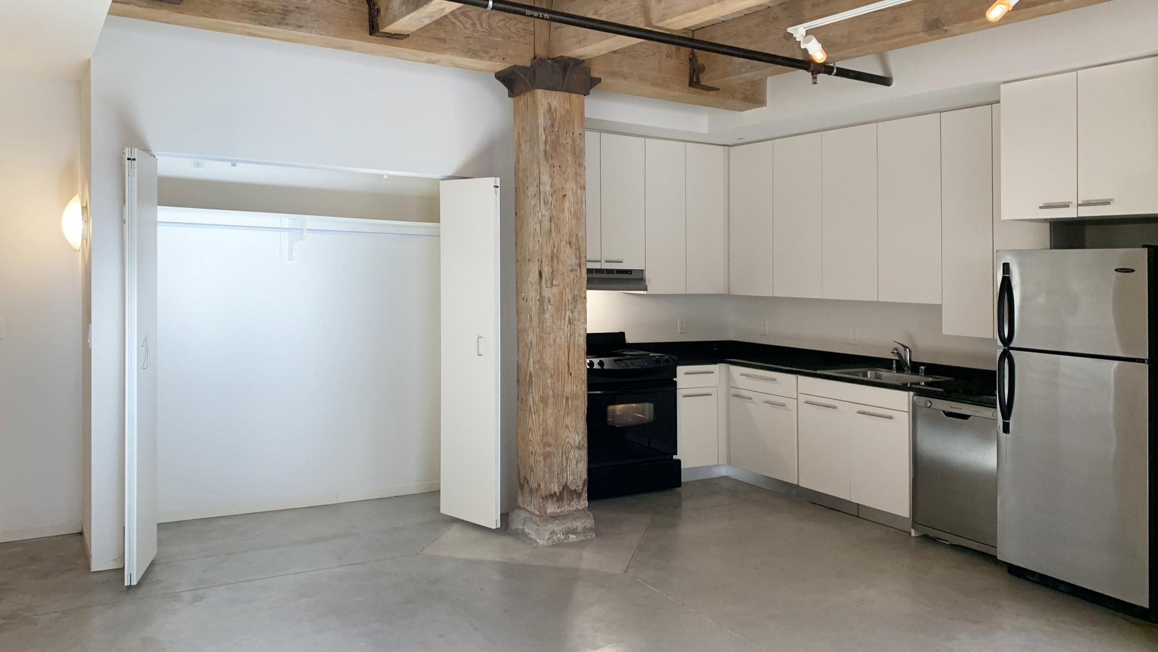Tobacco-Lofts-at-The-Yards-Apartment-E106-One-Bedroom-Historic-Design-Exposed-Brick-Concrete-Floors-Downtown-Madison-Fitness-Lounge-Courtyard-Views-Cat-Upscale-Modern-Home