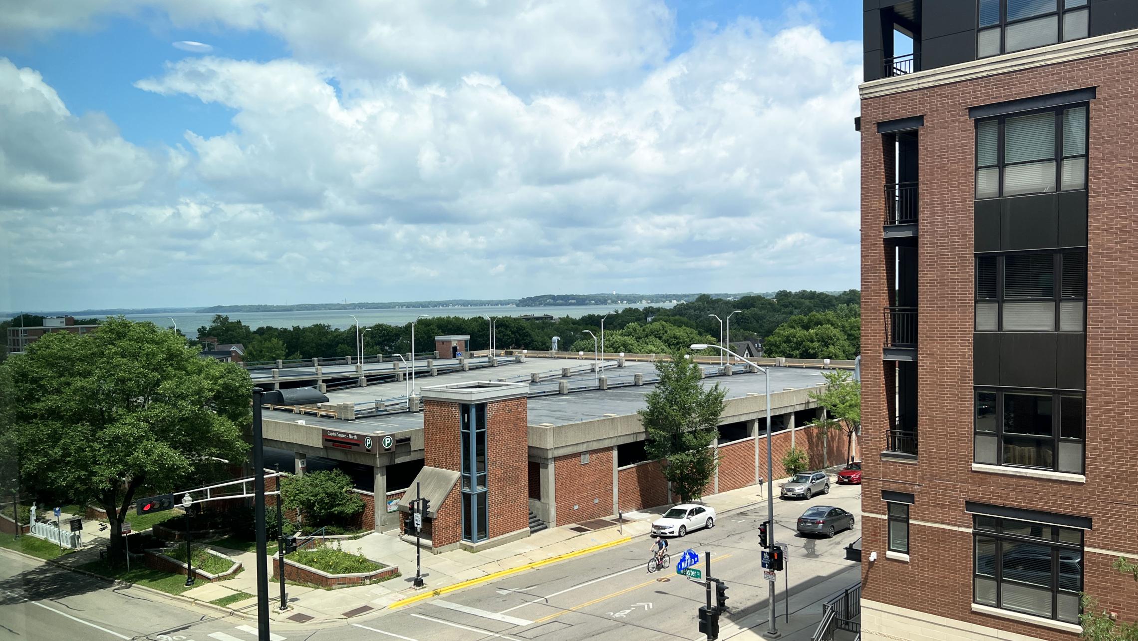 Capitol-Hill-Apartments-403-One-Bedroom-Downtown-Madison-Capitol-Square-Living-Dining-Bathroom-Views-City-Lifestyle-Cats-Modern-Luxury-Design-Laundry-Lake