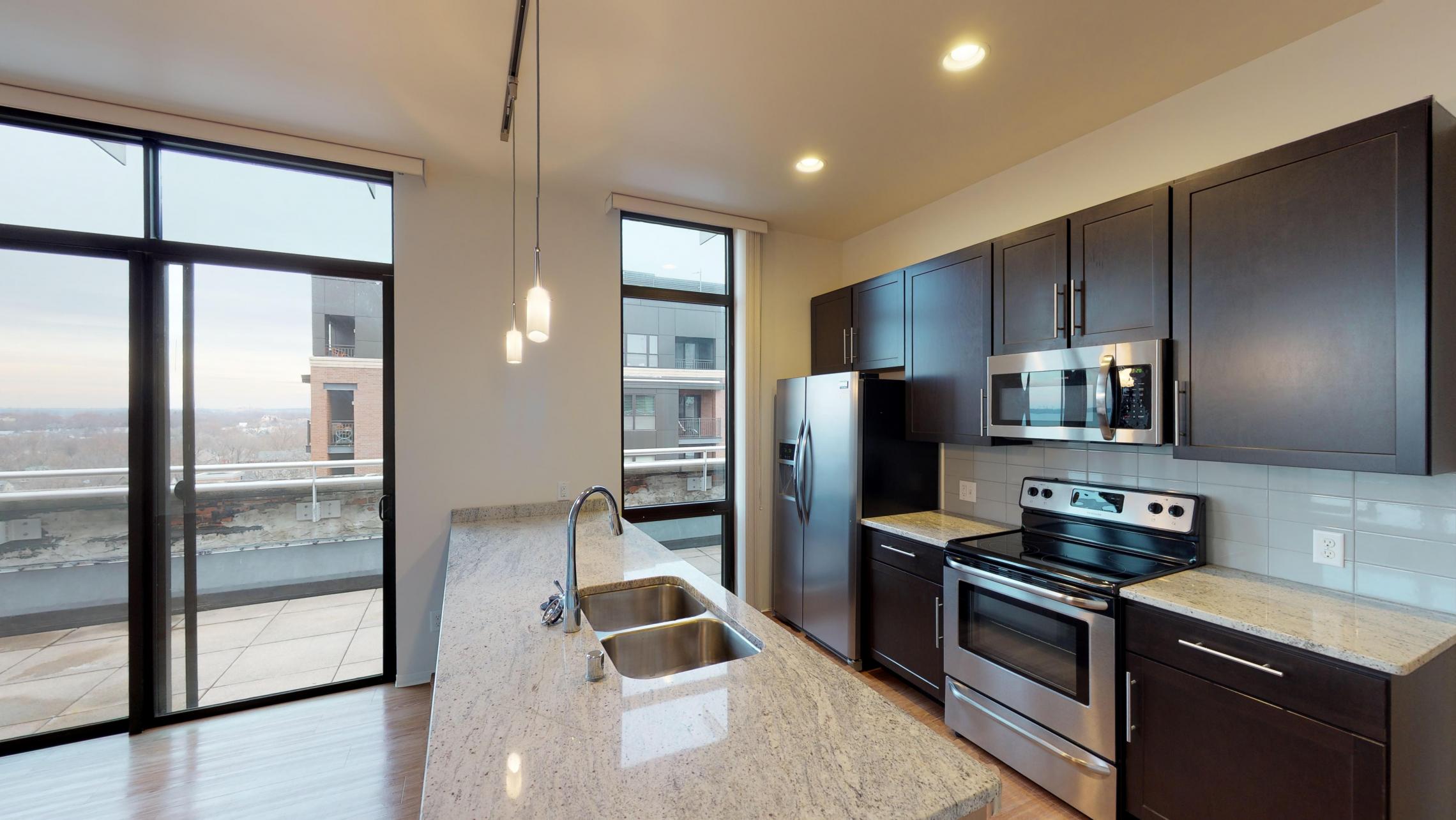 Capitol-Hill-Apartment-501-Two-Bedroom-Corner-Terrace-Lake-Capitol-Square-Downtown-Madison-Modern-Design-Lifestyle-Upscale-Luxury-Cats-Views-City-Bathroom-Storage-Kitchen