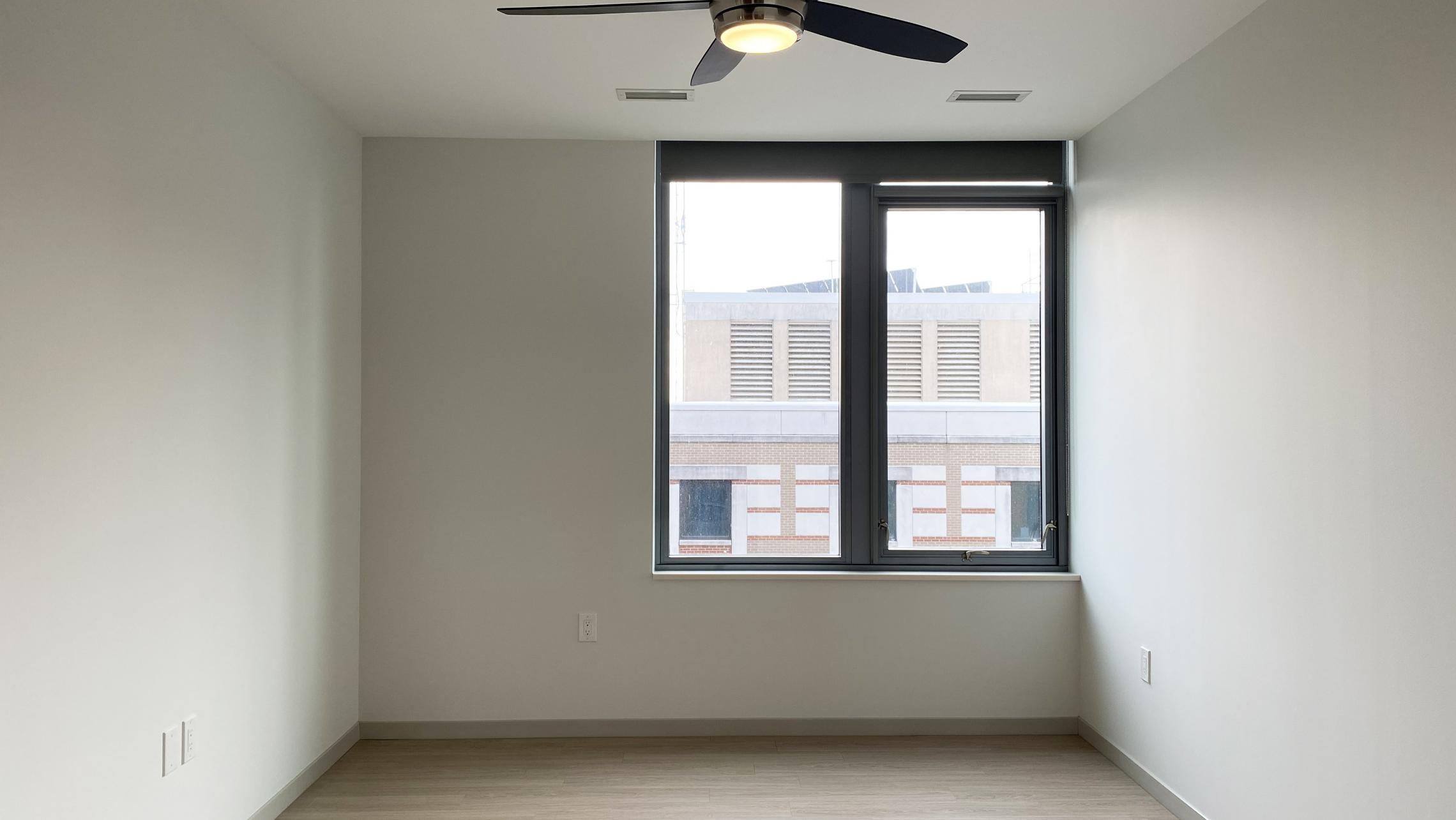 The-Pressman-Apartment-411-One-Bedroom-One-Bath-Kitchen-Living-Upscale-Luxurious-Modern-Exposed-Duct-Concrete-Capitol-Square-Downtown-Madison-Balcony-Terrace-Pets-Fitness-Lounge-Grill-Lifestyle