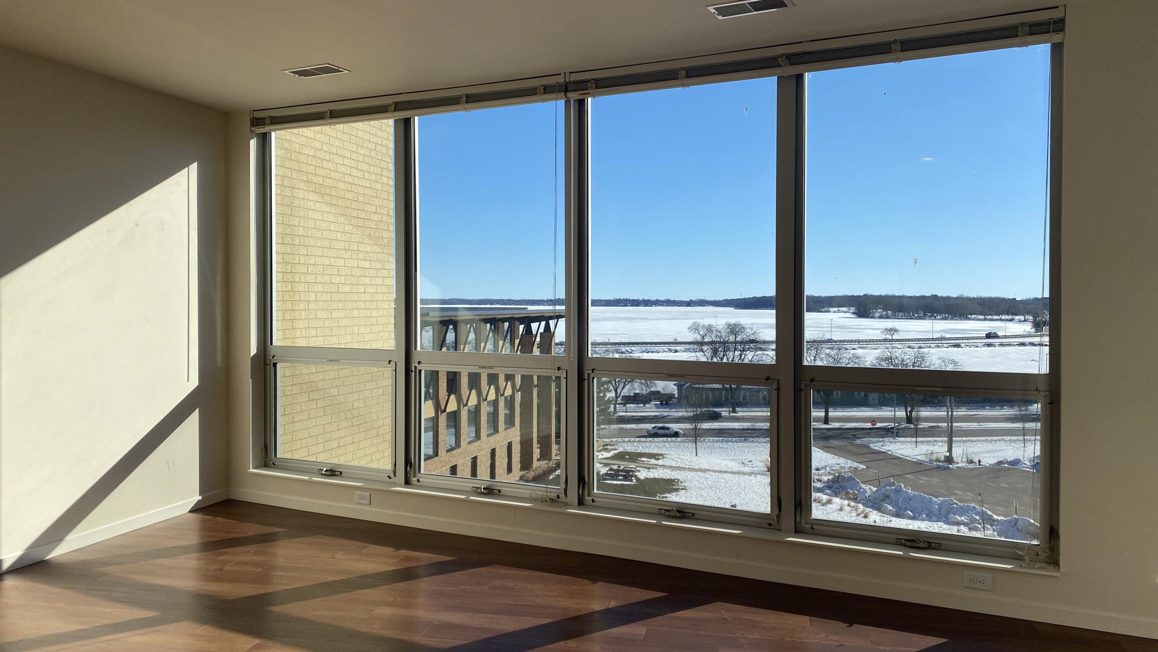 Nine-Line-at-The-Yards-Apartment-509-One-Bedrom-Corner-Lake-View-Top-Floor-Windows-Fitness-Kitchen-Living-Dining-Natural-Light-Modern-Upscale-Luxury-Maidson-Lake-Bike-Path-Dogs-Cats