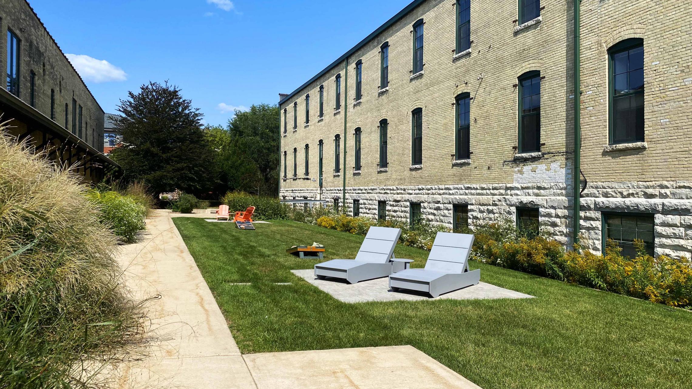 Tobacco-Lofts-Yards-Apartments-Historic-Exposed-Timber-Brick-Lounge-Coutyard-Grill-Fitness-Cats-Bike-Path-Lake-Downtown-Madison