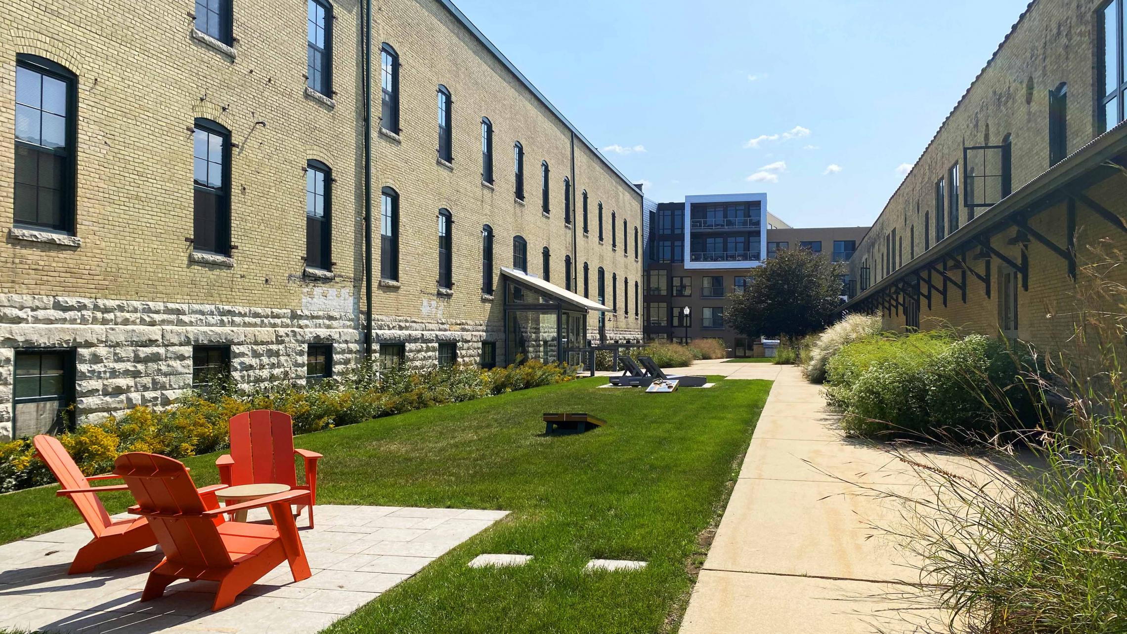 Tobacco-Lofts-Yards-Apartments-Historic-Exposed-Timber-Brick-Lounge-Coutyard-Grill-Fitness-Cats-Bike-Path-Lake-Downtown-Madison