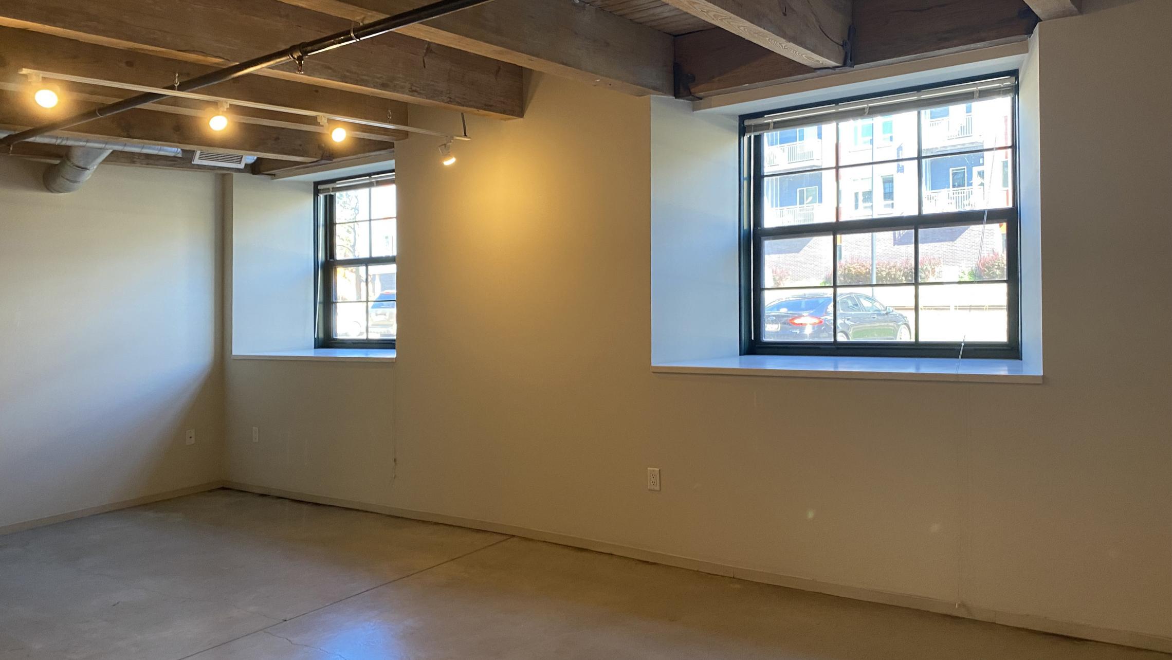 Tobacco-Lofts-at-The-Yards-Apartment-E105-One-Bedroom-Historic-Design-Exposed-Brick-Concrete-Floors-Downtown-Madison-Fitness-Lounge-Courtyard-Views-Cat-Upscale-Modern-Home