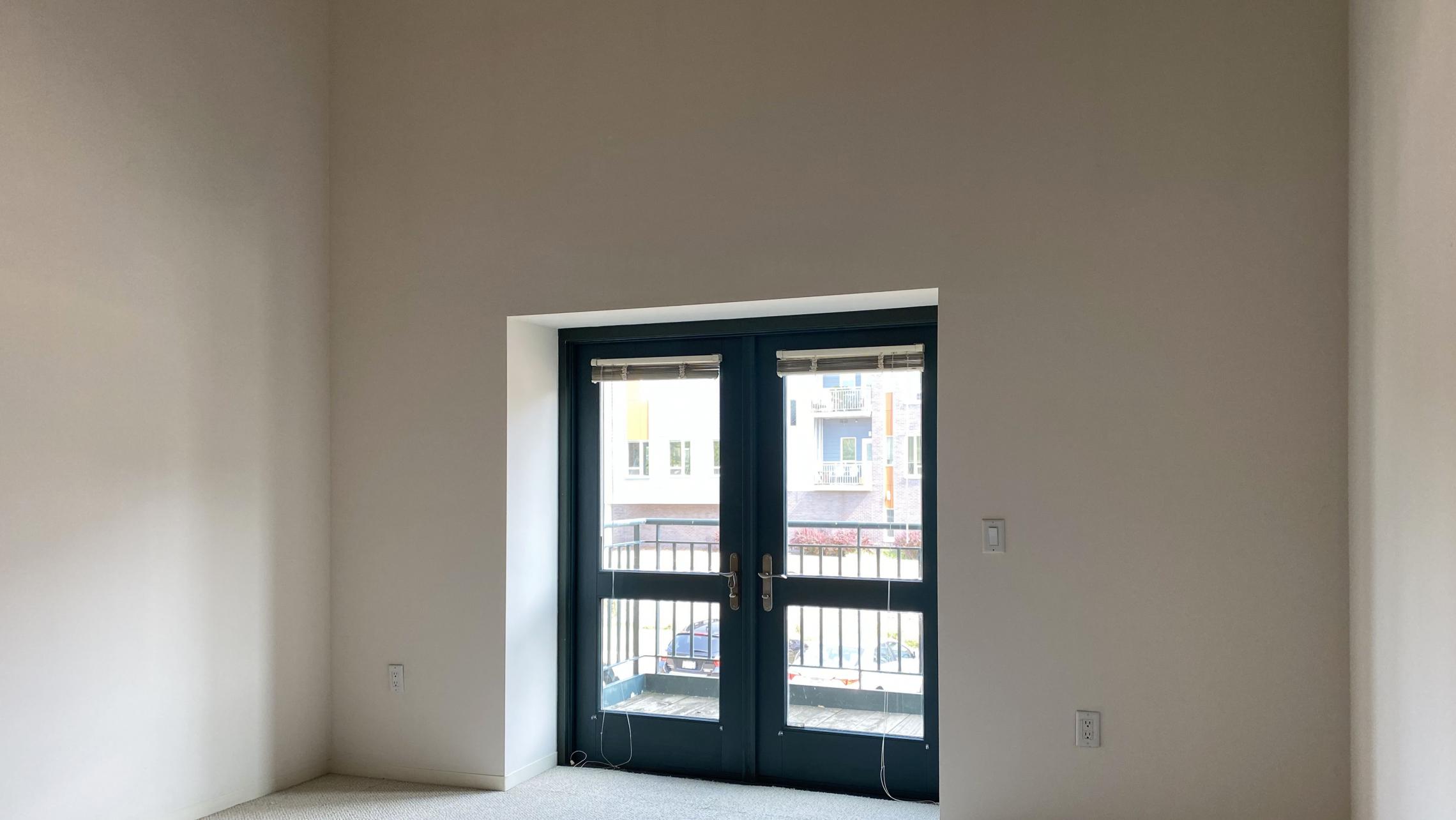 Tobacco-Lofts-at-The-Yards-Apartment-E209-One-Bedroom-Historic-Exposed-Brick-Timber-Beams-Unique-Design-Cats-High-Ceiling-Balcony-Downtown-Madison-Fitness-Lounge-Courtyard