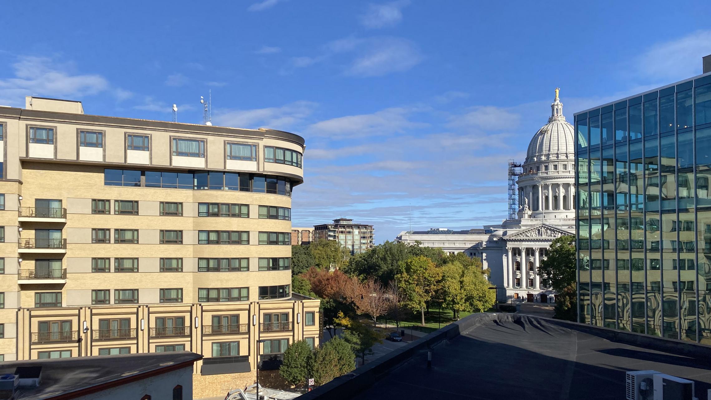 The-Pressman-Apartment-602-Two-Bedroom-Two-Bath-Kitchen-Living-Upscale-Luxurious-Modern-Exposed-Duct-Concrete-Capitol-Square-Downtown-Views-Madison-Balcony-Terrace-Pets-Fitness-Lounge-Grill-Lifestyle