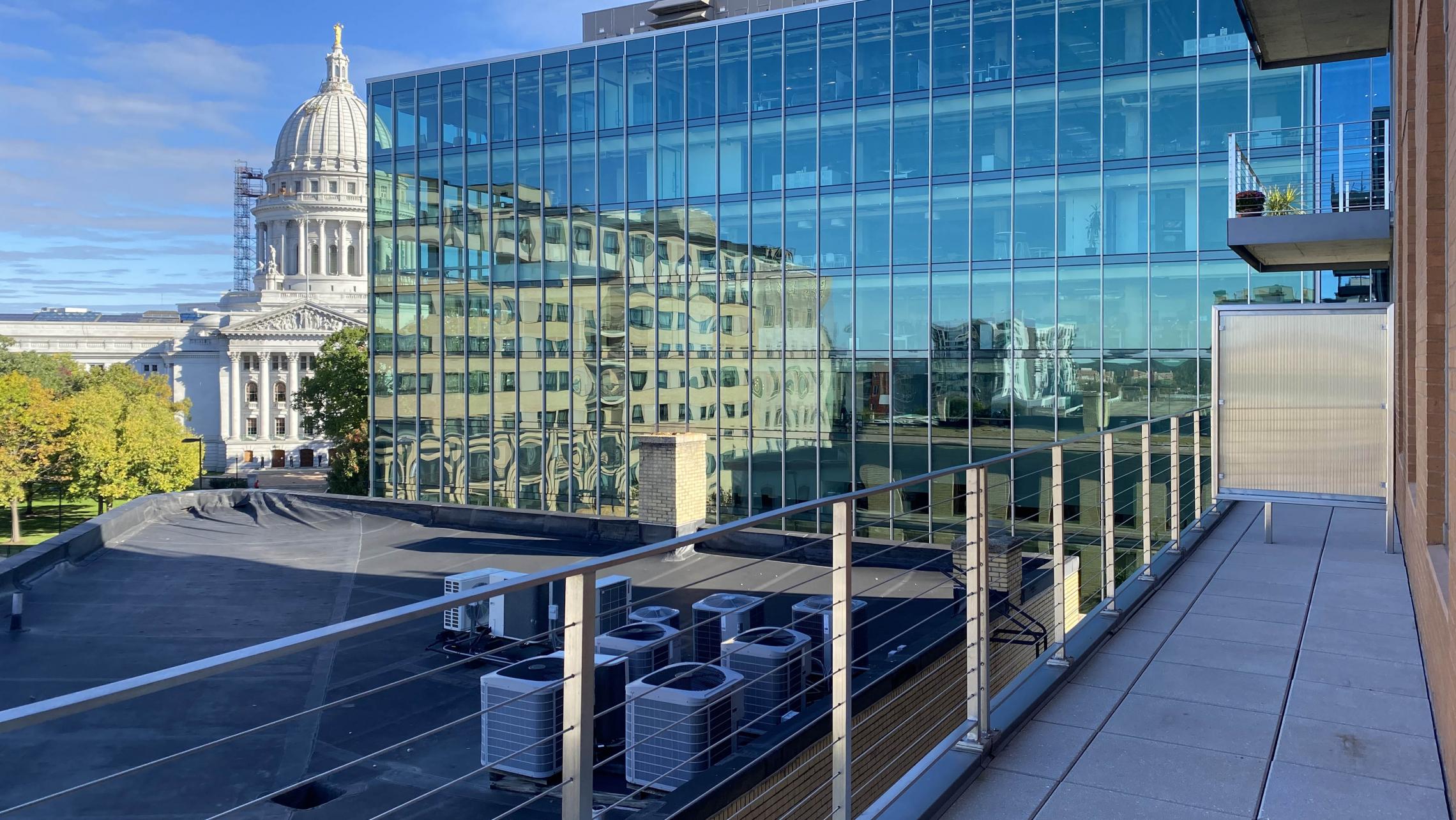 The-Pressman-Apartment-602-Two-Bedroom-Two-Bath-Kitchen-Living-Upscale-Luxurious-Modern-Exposed-Duct-Concrete-Capitol-Square-Downtown-Views-Madison-Balcony-Terrace-Pets-Fitness-Lounge-Grill-Lifestyle