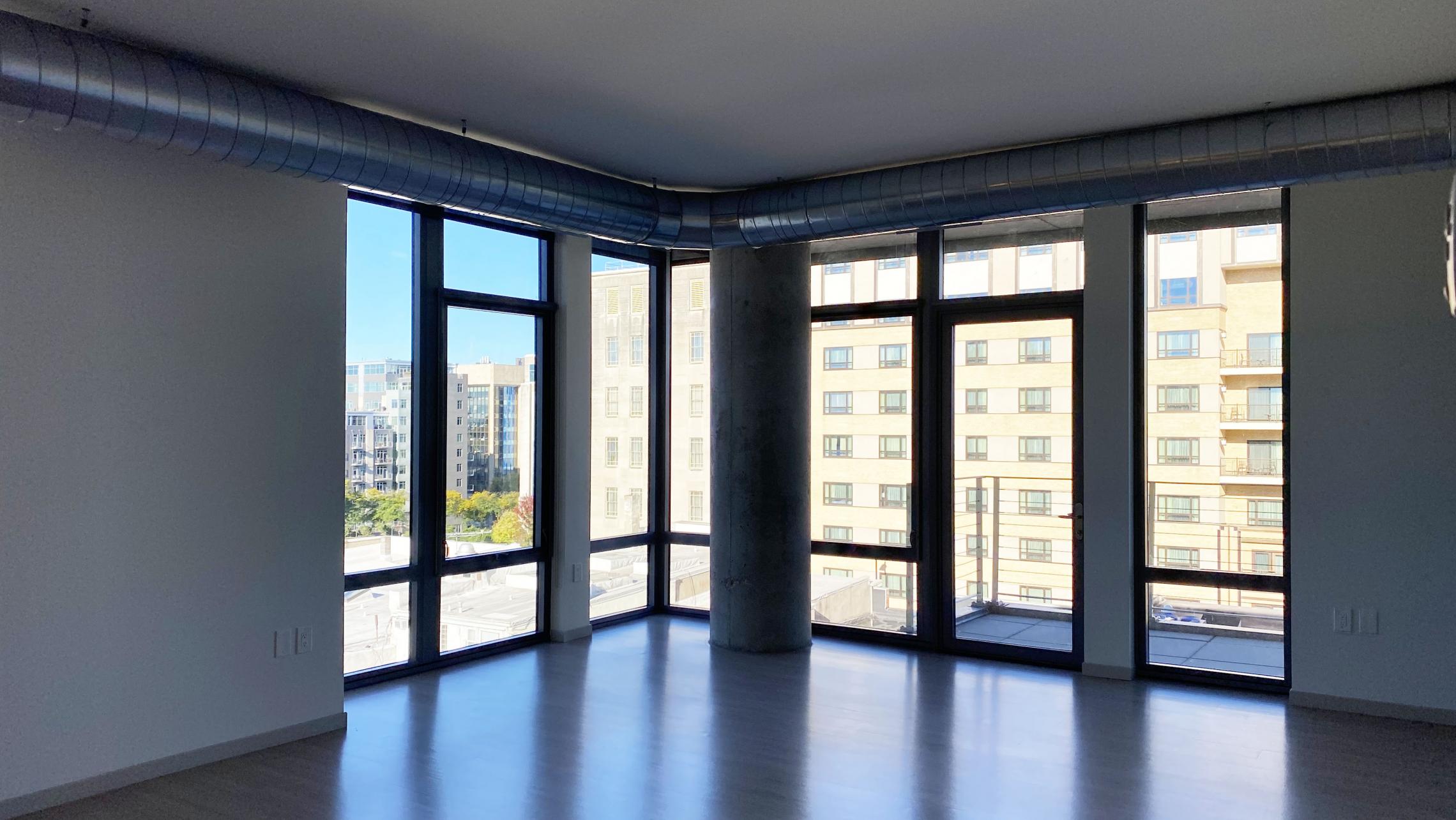 The-Pressman-Apartment-602-Two-Bedroom-Two-Bath-Kitchen-Living-Upscale-Luxurious-Modern-Exposed-Duct-Concrete-Capitol-Square-Downtown-Views-Madison-Balcony-Terrace-Pets-Fitness-Lounge-Grill-Lifestyle