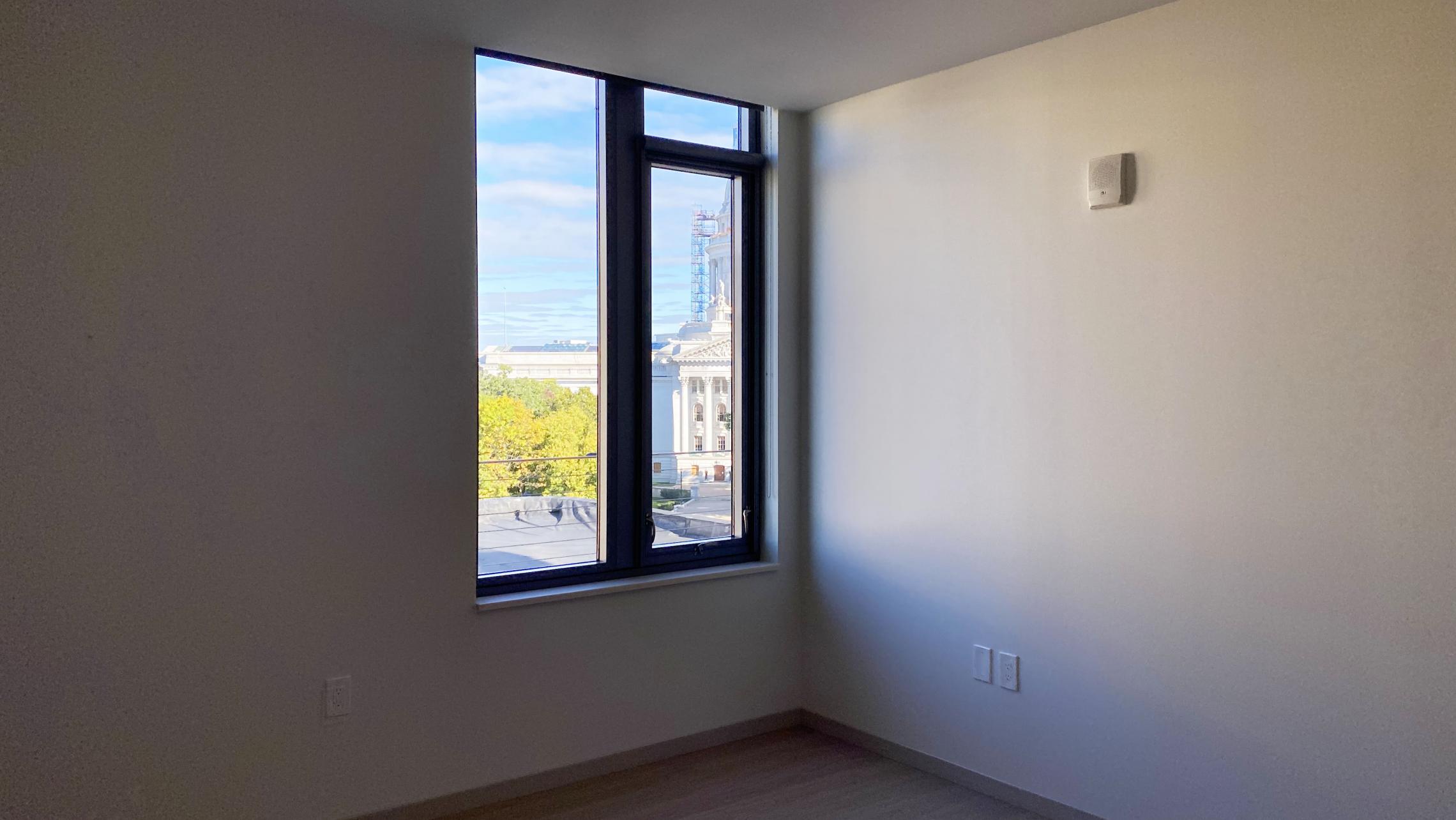 The-Pressman-Apartment-602-Two-Bedroom-Two-Bath-Kitchen-Living-Upscale-Luxurious-Modern-Exposed-Duct-Concrete-Capitol-Square-Downtown-Views-Madison-Balcony-Terrace-Pets-Fitness-Lounge-Grill-Lifestyle