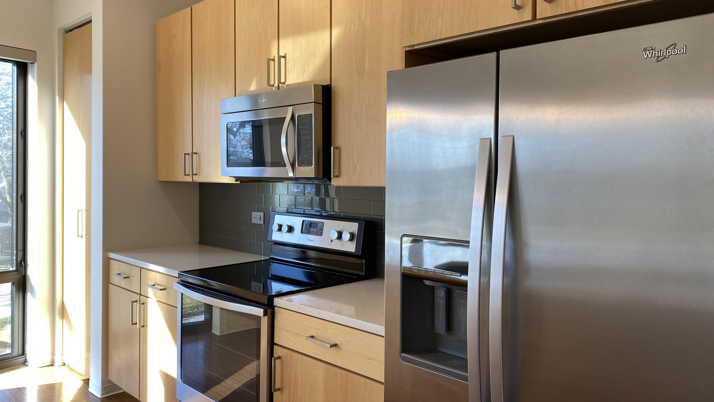SEVEN27-at-The-Yards-Apartment-204-One-Bedroom-Modern-Upscale-Luxury-Design-Radiant-Heating-Fitness-Lounge-Fireplace-Courtyard-Downtown-Madison-Cats-Dogs-Lifestyle-Natural-Light-Lake-View