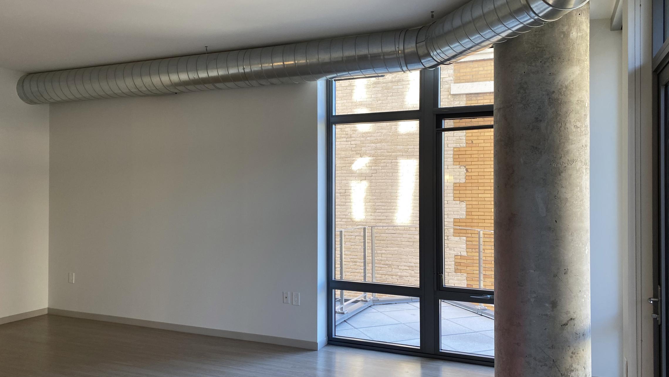 The-Pressman-Apartment-312-Two-Bedroom-One-Bath-ADA-Upscale-Luxurious-Modern-Exposed-Duct-Concrete-Capitol-Square-Downtown-Madison-Balcony-Terrace-Pets-Fitness-Lounge-Grill-Lifestyle