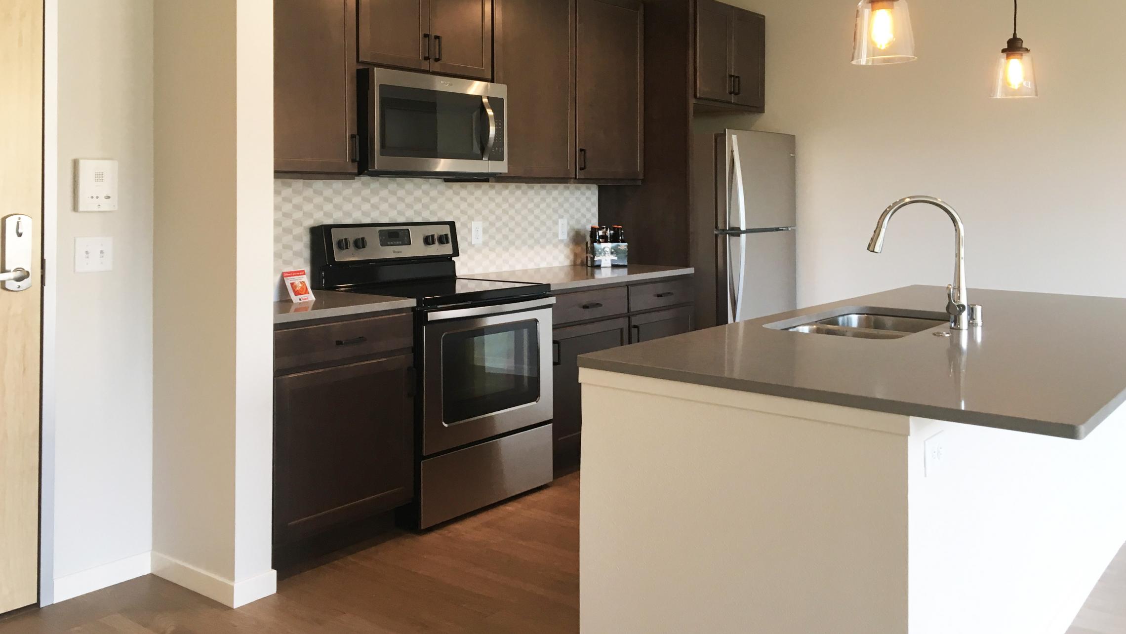 Quarter-Row-at-The-Yards-Apartment-216-Three-Bedroom-Bathroom-Living-Kitchen-Laundry-Fitness-Courtyard-Lounge-Modern-Upscale-Downtown-Madison-Capitol-Bike-Trail-Lake-Lifestyle