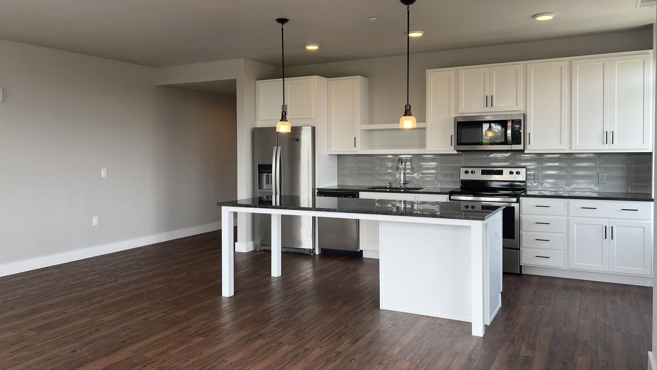 1722-Monroe-Apartment-401-Two-Bedroom-One-Bathroom-Corner-Camp-Randall-Luxury-Living-Kitchen-Design-Rooftop-Terrace-Views-City-Madison-Fitness-Lounge-Balcony-Lifestyle-Capitol