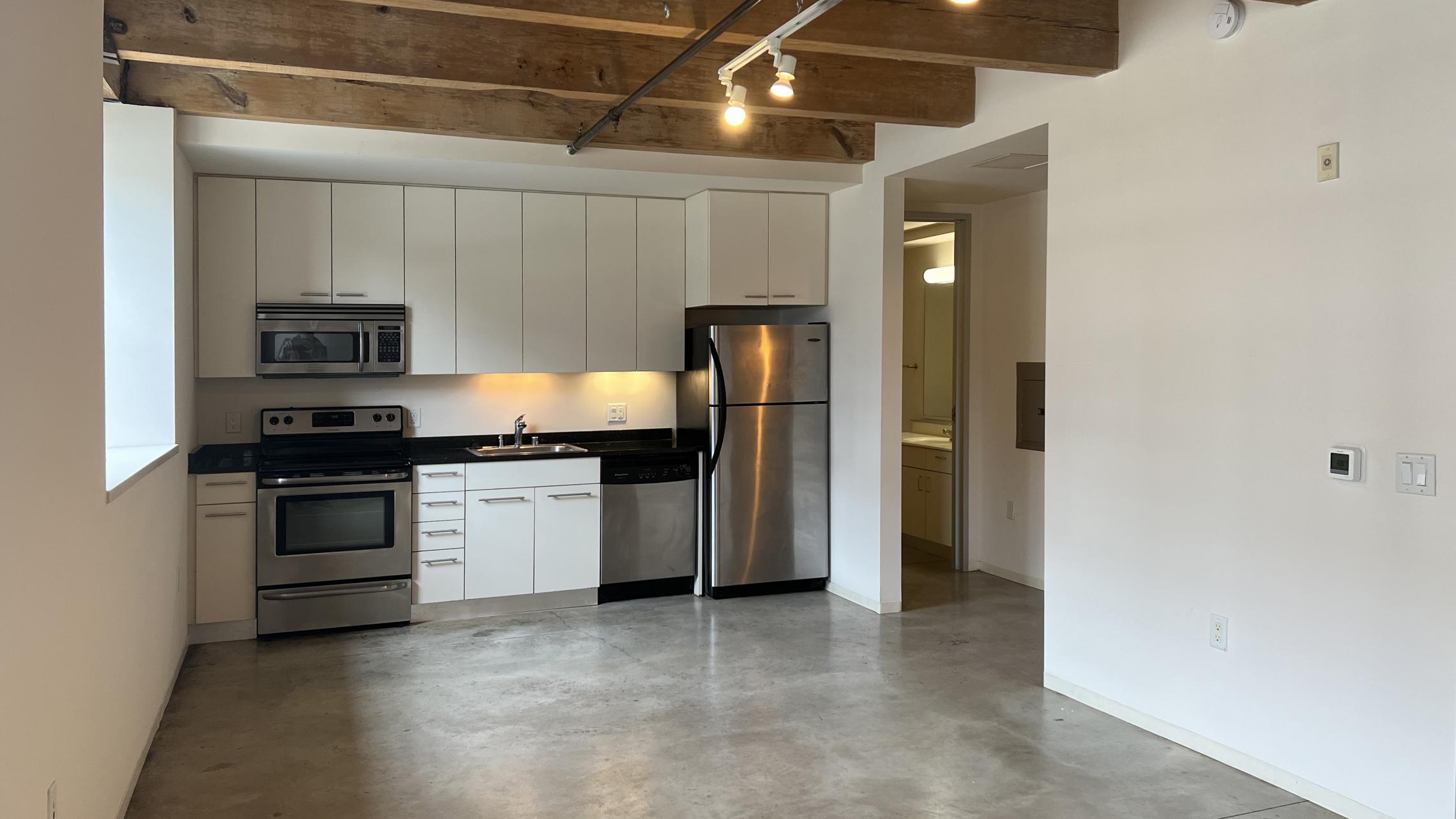 Tobacco-Lofts-at-The-Yards-Apartment-E107-Studio-Historic-Design-Exposed-Brick-Concrete-Floors-Downtown-Madison-Fitness-Lounge-Courtyard-Views-Cat-Upscale-Modern-Home