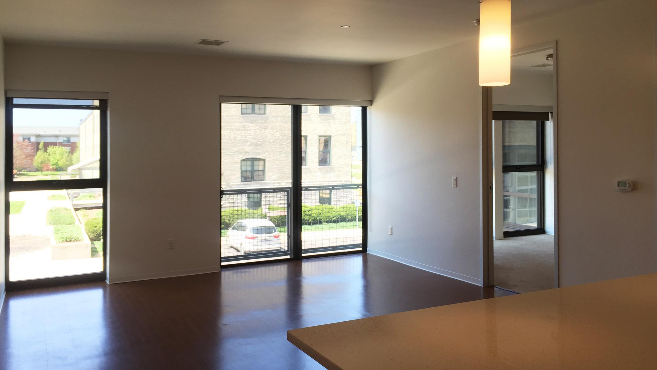 ULI Seven27 Apartment 222 - Living-Room-Tobacco-Lofts-View-Luxury-Modern-Upscale-Fitness-Lounge-Lifestyle-Downtwon-Madison-Courtyard-Lake