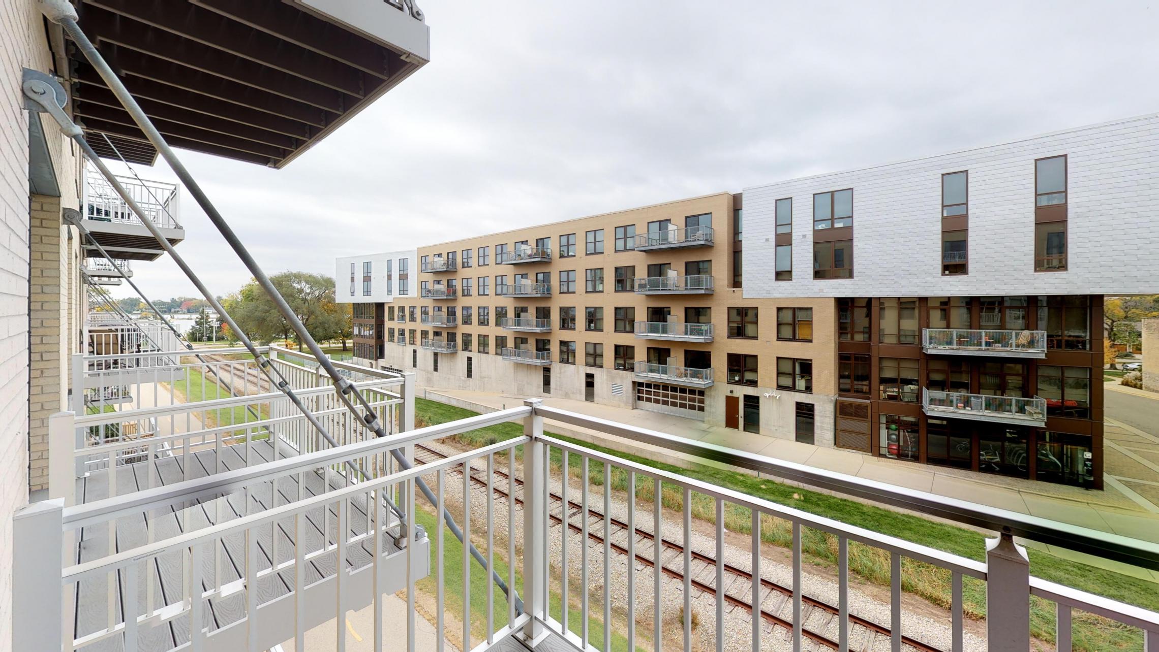 Nine-Line-Apartment-316-Kitchen- Living-Upsclale-Modern-Downtown-Madison-One-Bedroom-Balcony-View-Bike-Path-Monona-Bay-Fitness-Design-Bathroom