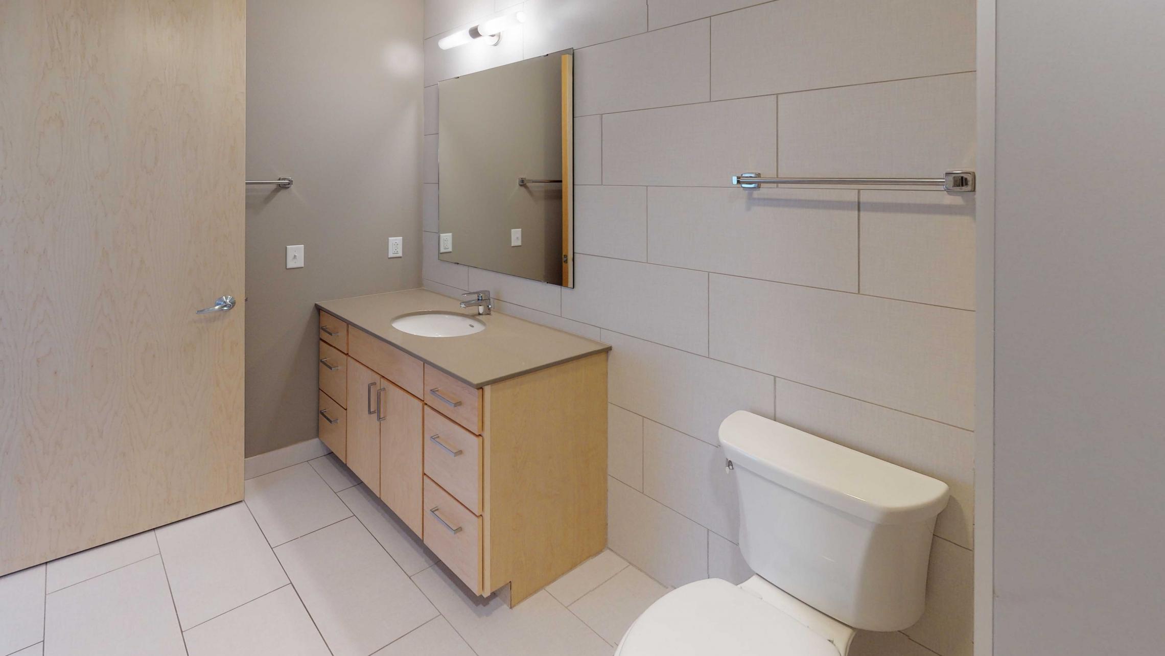 Nine-Line-Apartment-222-One-Bedroom-Living-Kitchen-Upscale-Modern-Design-Downtown-Madison-Sunny-Bright-Lifestyle-Bathroom