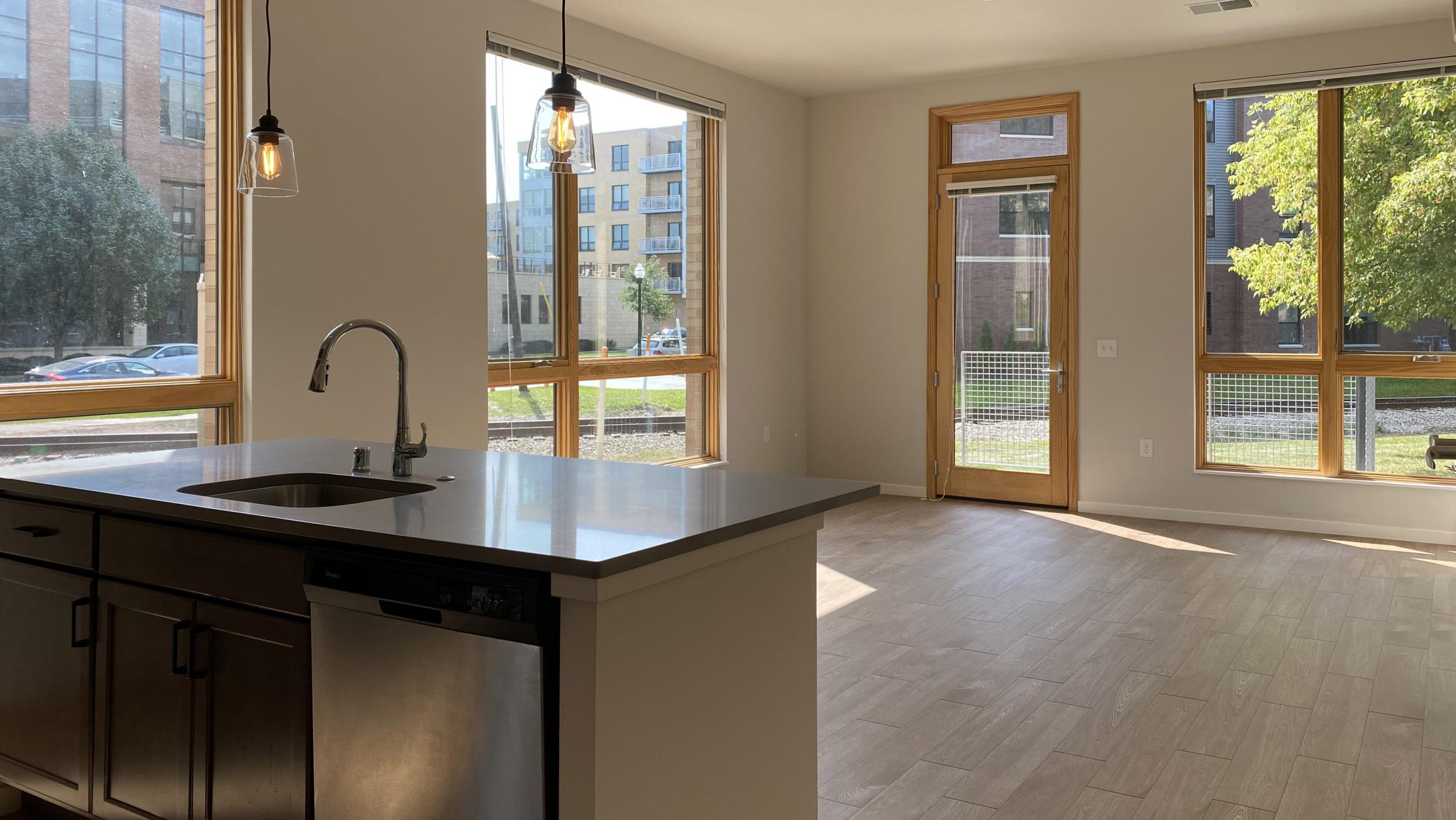 Quarter-Row-The-Yards-Apartment-102-Corner-Balcony-Downtown-Madison-Bike-Cat-Dog-Lifestule-Modern-Upscale-Design-Living-Kitchen.jpg