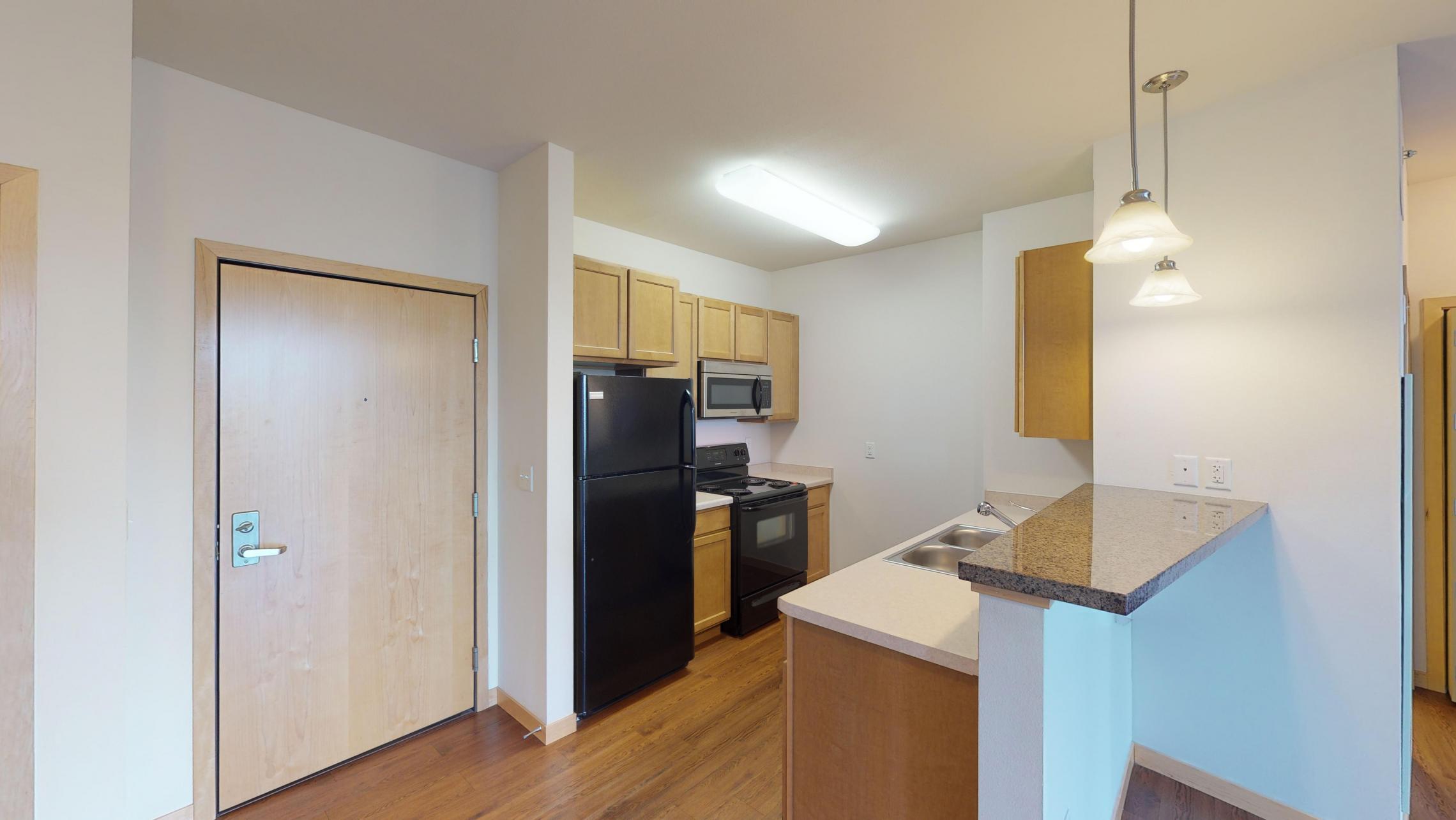 The-Depot-Apartments-Downtown-Madison-Lifestyle-Large-Closet-Bike-Storage-Washington-Ave-Style-Design-Balcony-Apartment-1-415-One-Bedroom-Den