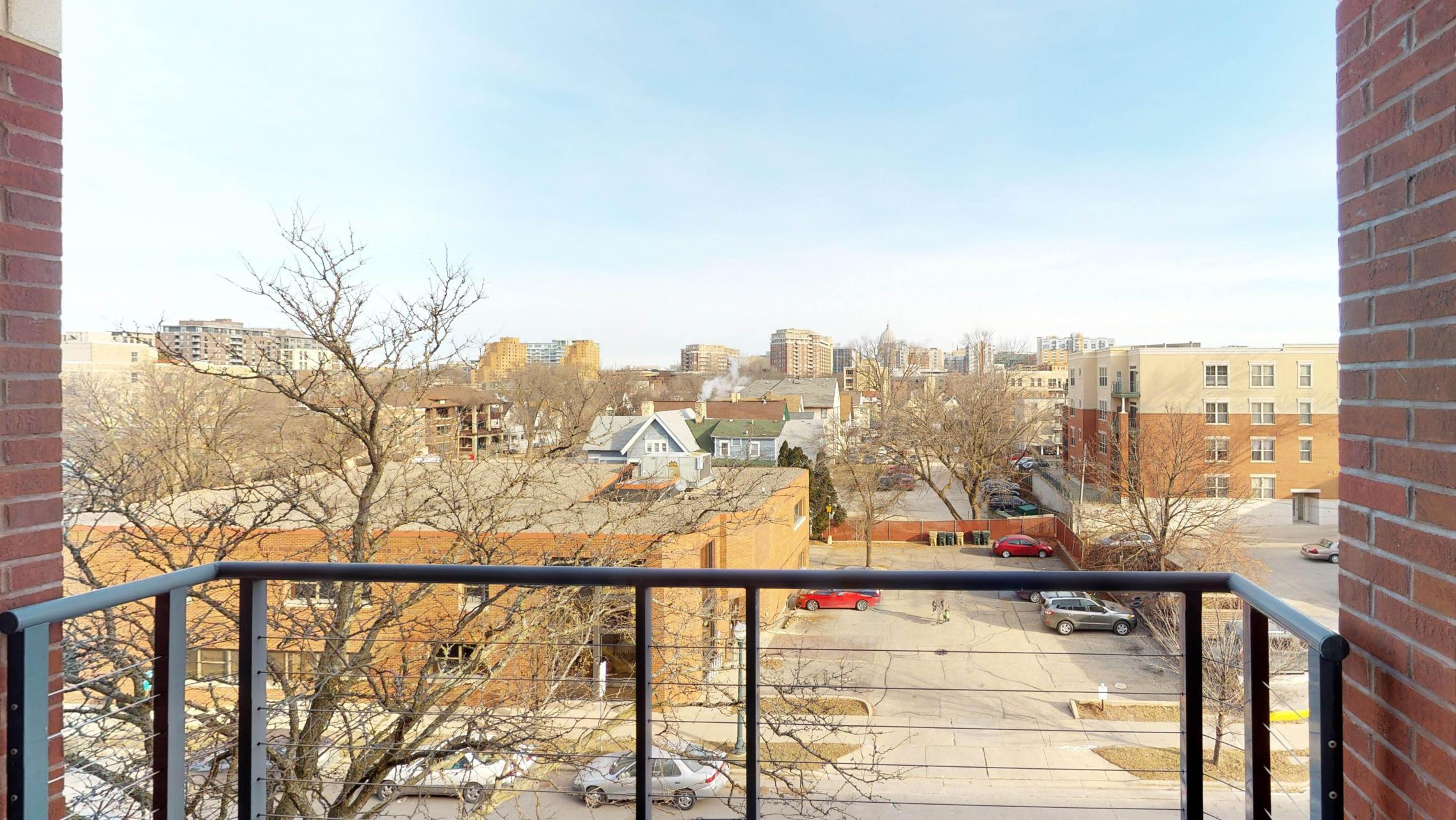 The-Depot-Apartments-Downtown-Madison-Lifestyle-Large-Closet-Bike-Storage-Washington-Ave-Style-Design-Balcony-Apartment-1-415-One-Bedroom-Den