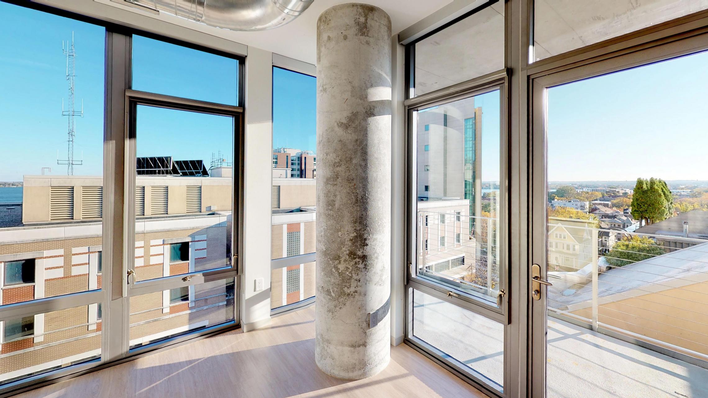 The-Pressman-Apartment-513-One-Bedroom-Living-Room-View-Kitchen-Island-Downtown-Madison-Capitol-Balcony-Views.jpg
