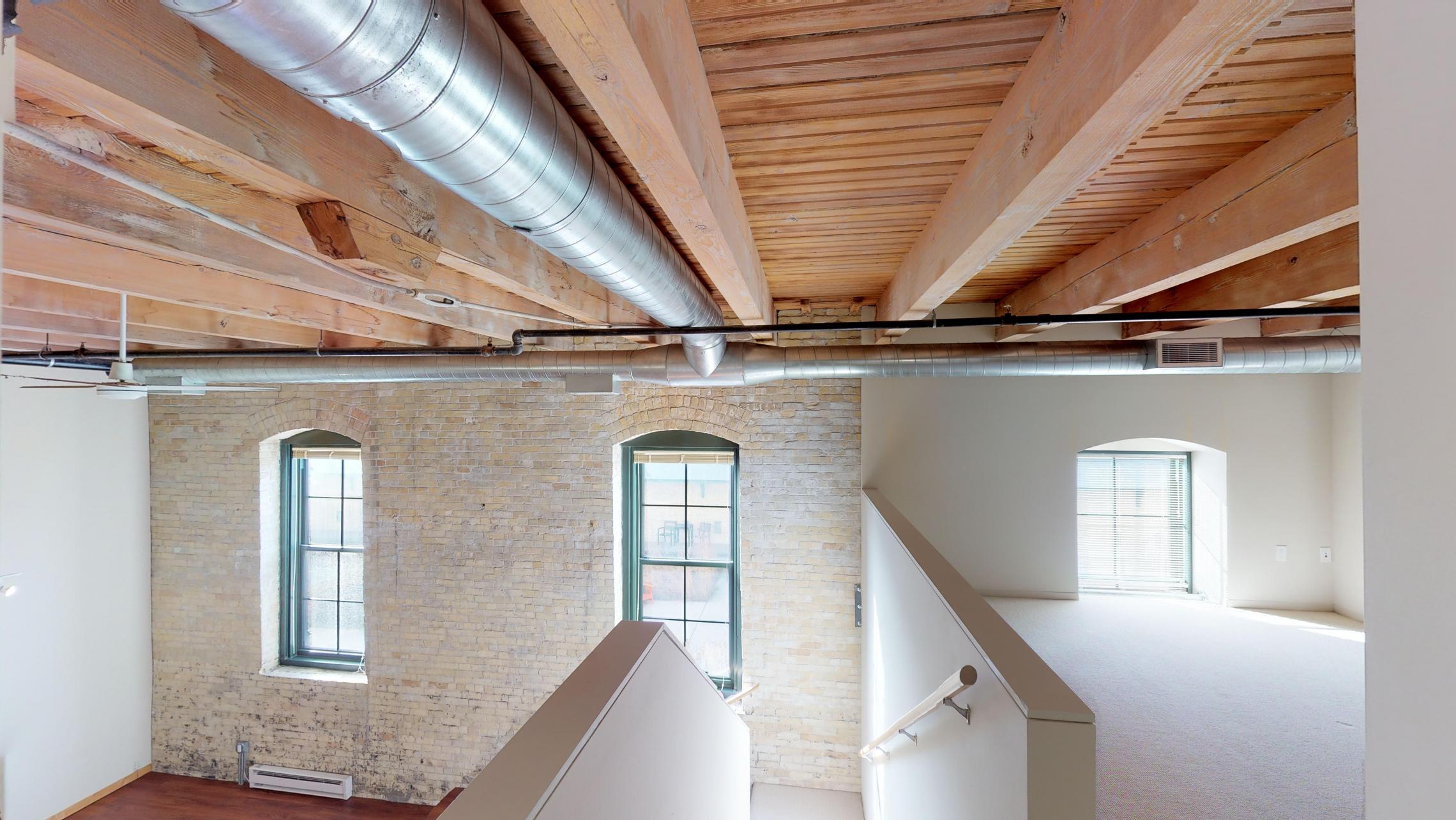 Tobacco-Lofts-Apartments-Lofted-Design-Unique-Upscale-Stunning-Sunshine-Cats-Lofted-Brick-Garage-Courtyard-Grill-Fitness-Historic-Yards-Warehouse-Apartment- E204-Lofted-Two-Bedroom