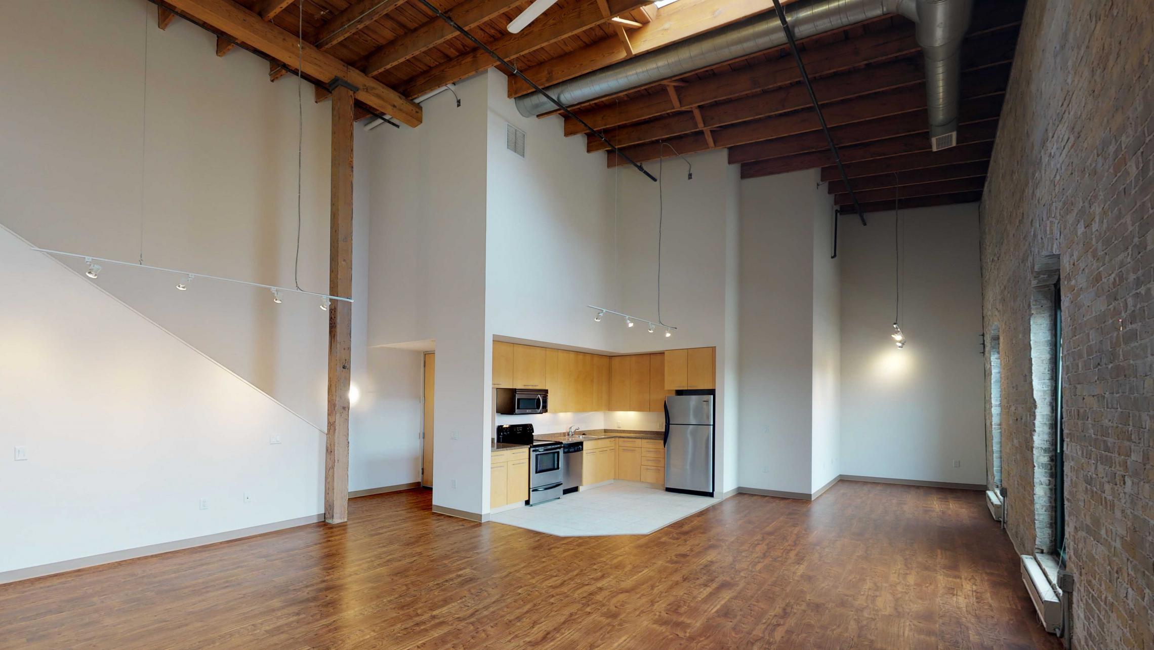Tobacco-Lofts-Apartment-E306-Historic-Lofted-Two-Bedroom-Downtown-Madison-Yards-Exposures-Brick-Design.jpg