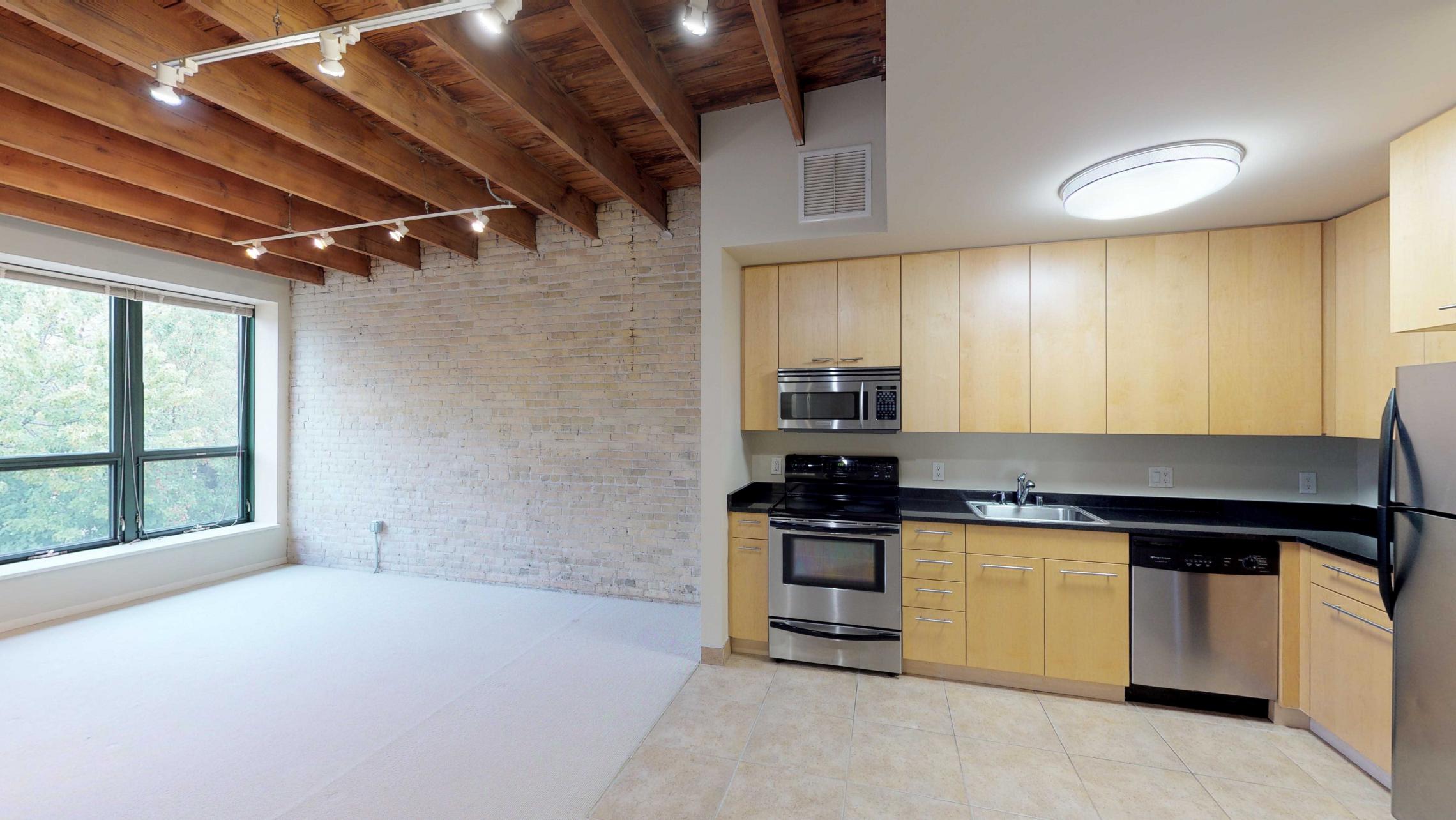 Tobacco-Lofts-Apartment-W220-Studio-Historic-Downtown-Madison-Yards-Kitchen-Exposures-Brick.jpg