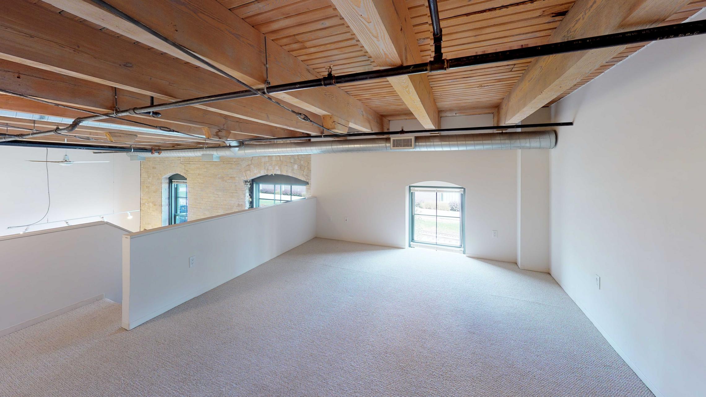 Tobacco-Lofts-E203-Historic-Two-bedroom-lofted-design-exposed-brick-downtown