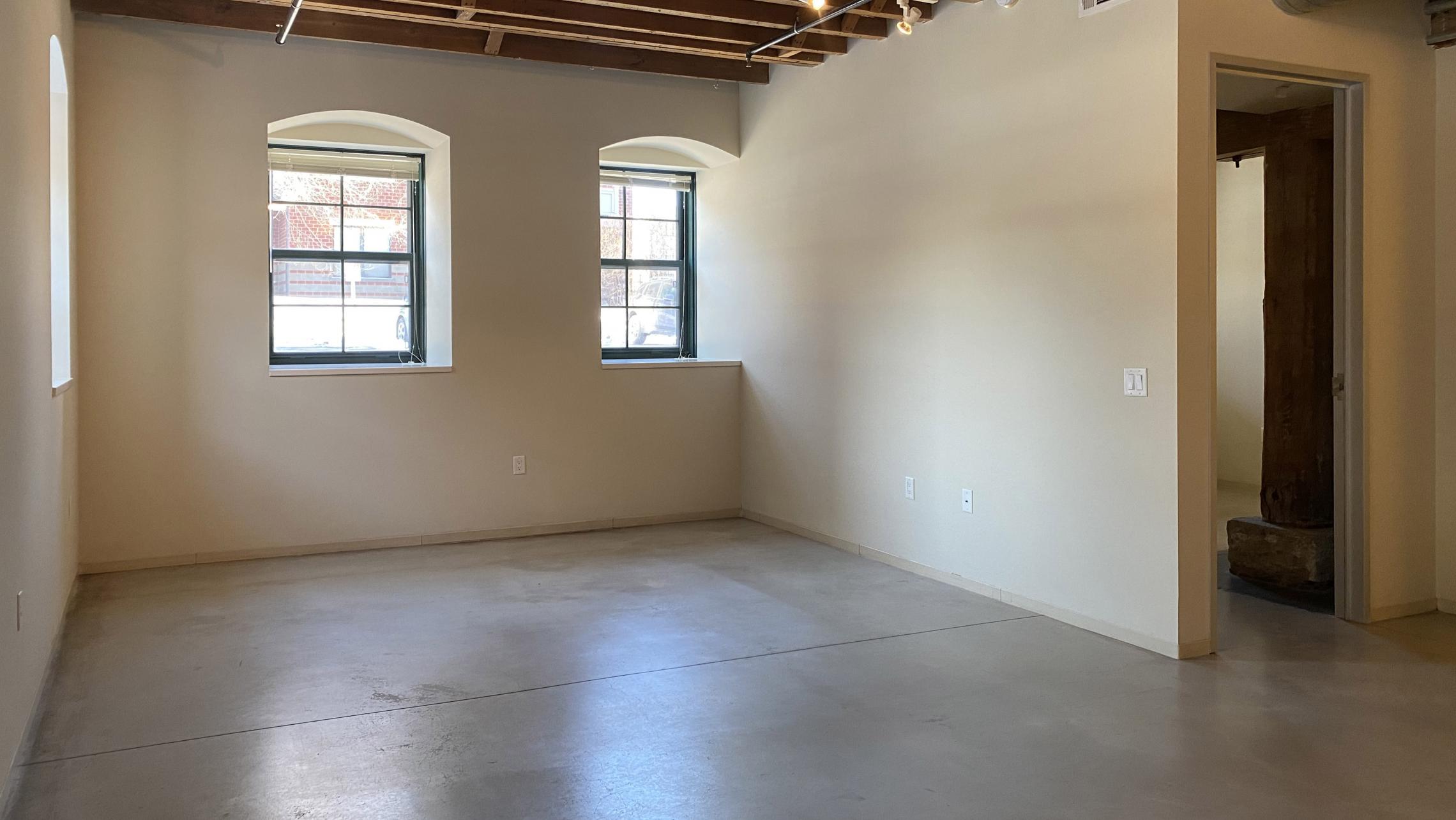 The-Tobacco-Lofts-One-Bedroom-Apartment-E112-Kitchen-Living-Room-Bedroom-Historic-Design-Unique-Downtwon-Madison-Bike-Trails-Lake-Exposed-Timber-Concrete-Floors