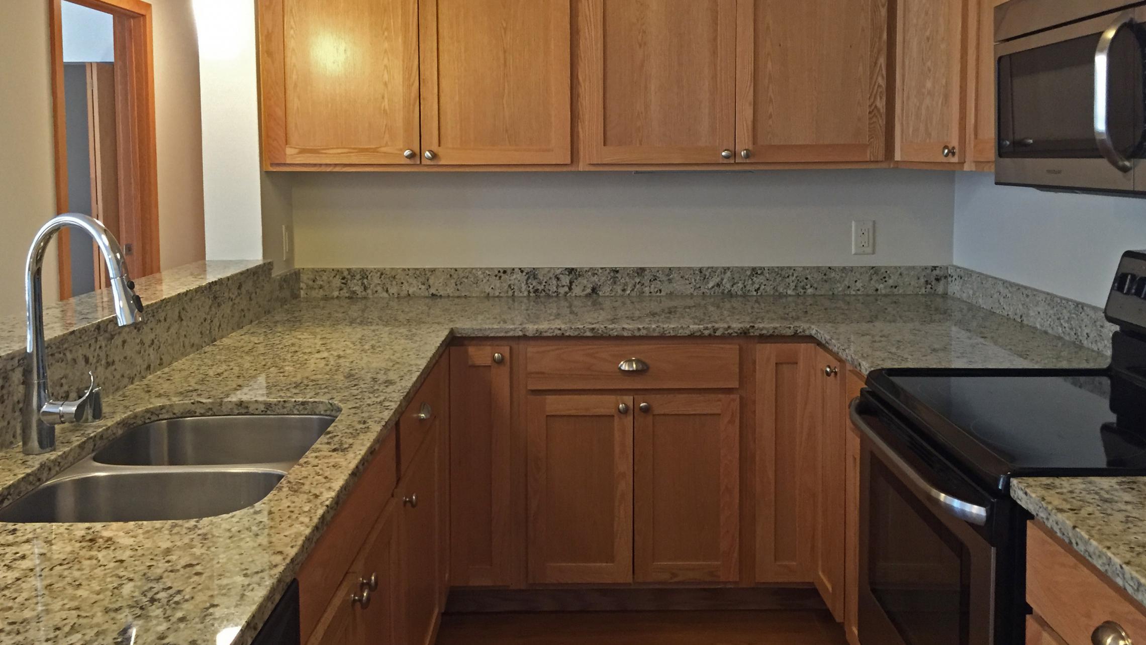 ULI Lincoln School Apartment 102 - Kitchen with Stainless Steel Appliances