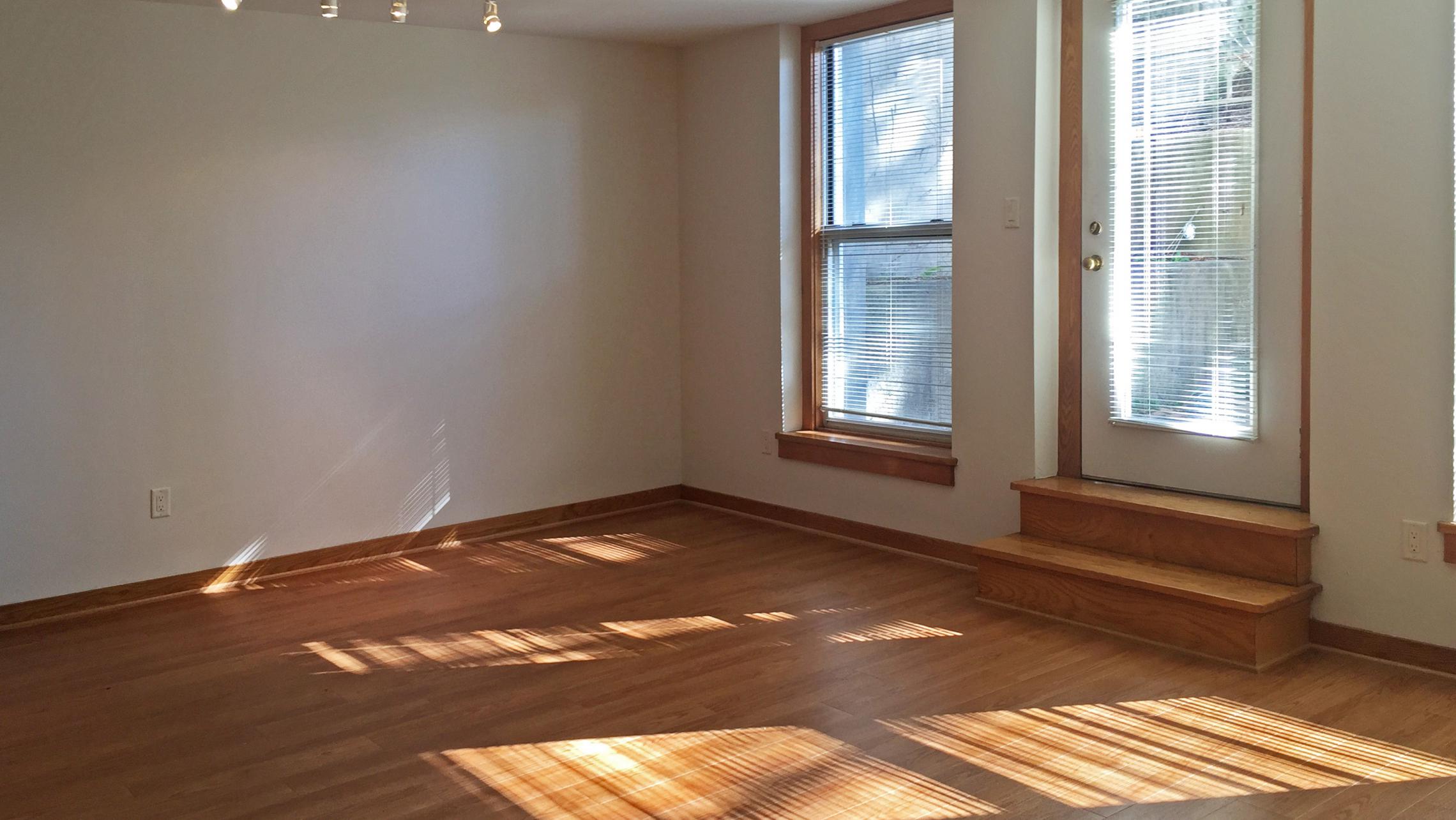 ULI Lincoln School Apartment 102 - Living Room with Patio Door