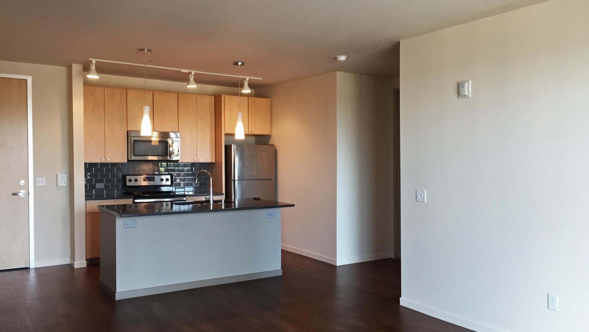 ULI Nine Line Apartment 218 - Kitchen and Living Area