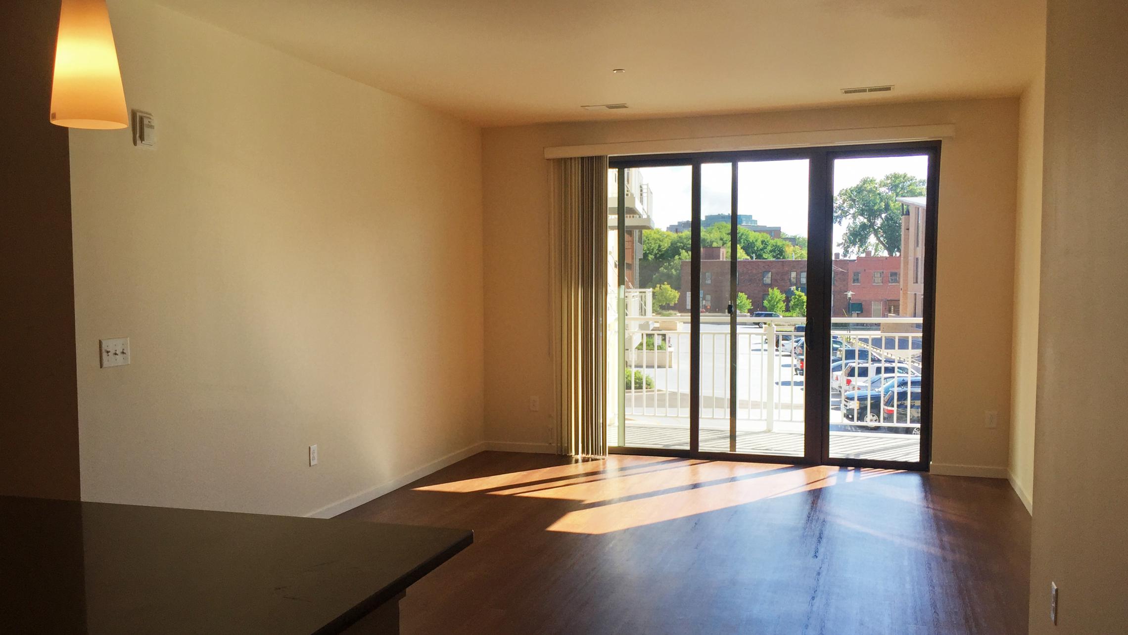 ULI Nine Line Apartment 215 - Living Room and Balcony