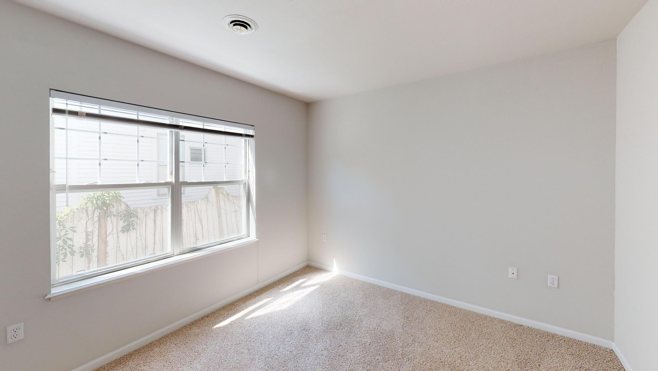 Wilson-Bay-Apartment-112-Two-Bedroom-Downtown-Madison-Guest-Room-Balcony-Corner.jpg