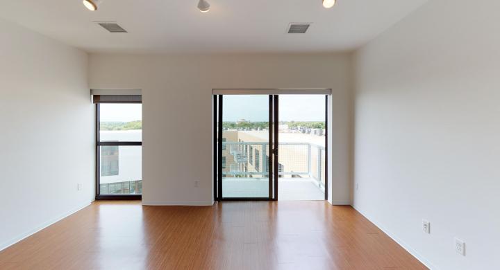 SEVEN27-Apartment-529-studio-lake view-modern-upscale-downtown-madison-patio-courtyard-living room-kitchen.jpg